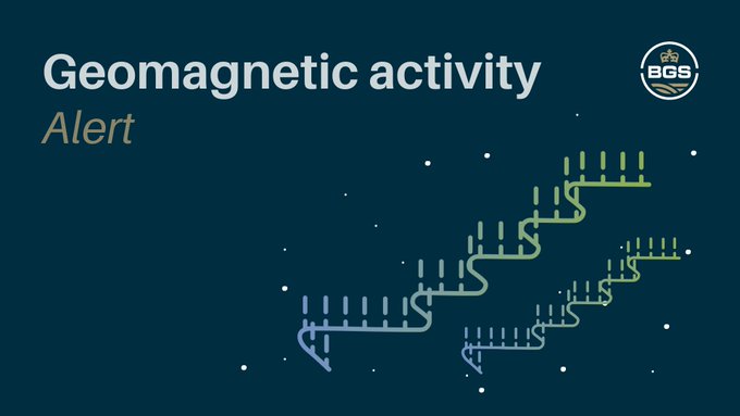 Geomagnetic activity alert graphic. Top left is the text 'geomagnetic activity' in white and 'alert' underneath in gold. Top right is the BGS roundel logo. To the right middle / bottom are two stylised aurora flares and some spots denoting stars. The graphic is blue. 