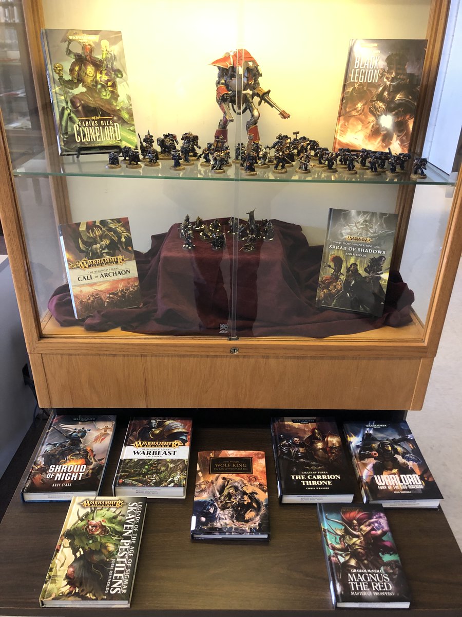njmolinari's tweet photo. Some really excellent--and brand new--Warhammer books donated to the library by Mr. Edwards. Now on display with hand-painted miniatures.  Come take a look! #warhammer https://t.co/In3bBtGqcA
