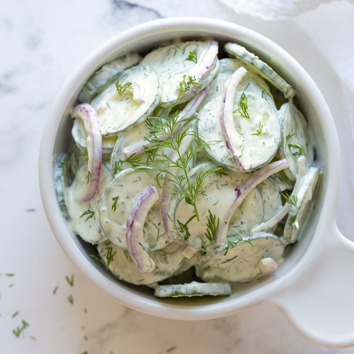 This creamy, light and refreshing German Cucumber Salad is an easy side dish that is perfect for just about any main course!  bit.ly/2Jiqyfe