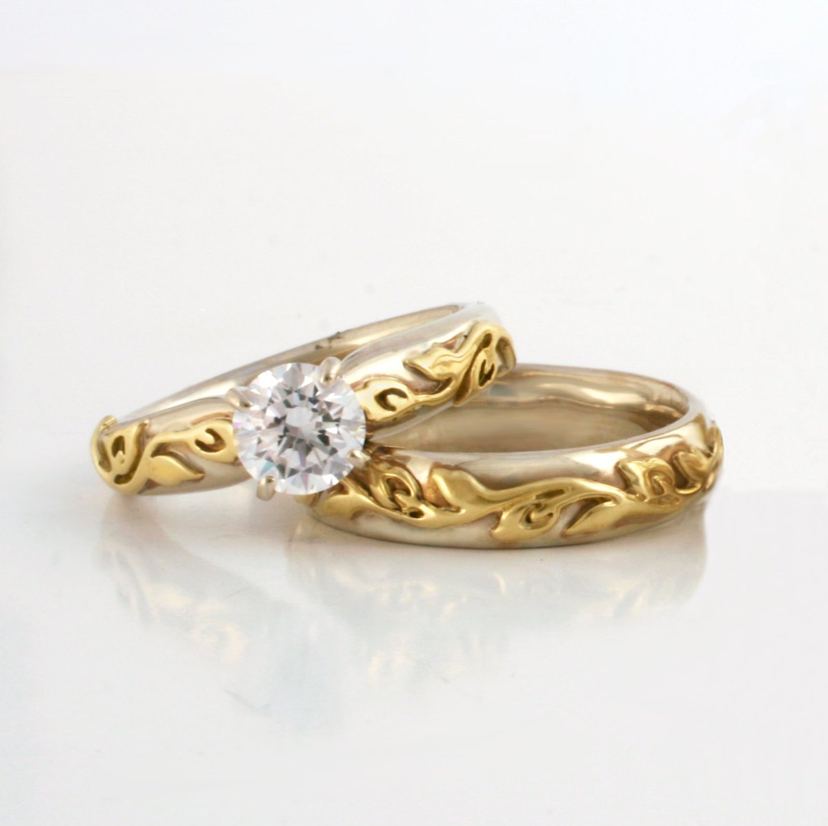 RIJewelry's tweet photo. Our two tone Flores rings perfectly illustrate our capacity as custom jewelers! We can swap metal colors, change the width, add a border to the design, or make any other changes you wish!

More variations here >> https://t.co/SFnfuFxnyH

#FloralWeddingRing #FloralEngagementRing https://t.co/6mejfhoU9Y