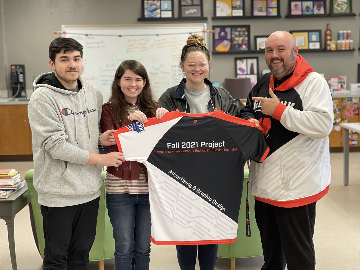 CVCCEsports's tweet photo. We presented our Advertising & Graphic Design students with a gift this morning - a customized jersey with the winning team’s names on it! #GameChangers 🎮 #RedHawkNation https://t.co/MTdeOqydGD