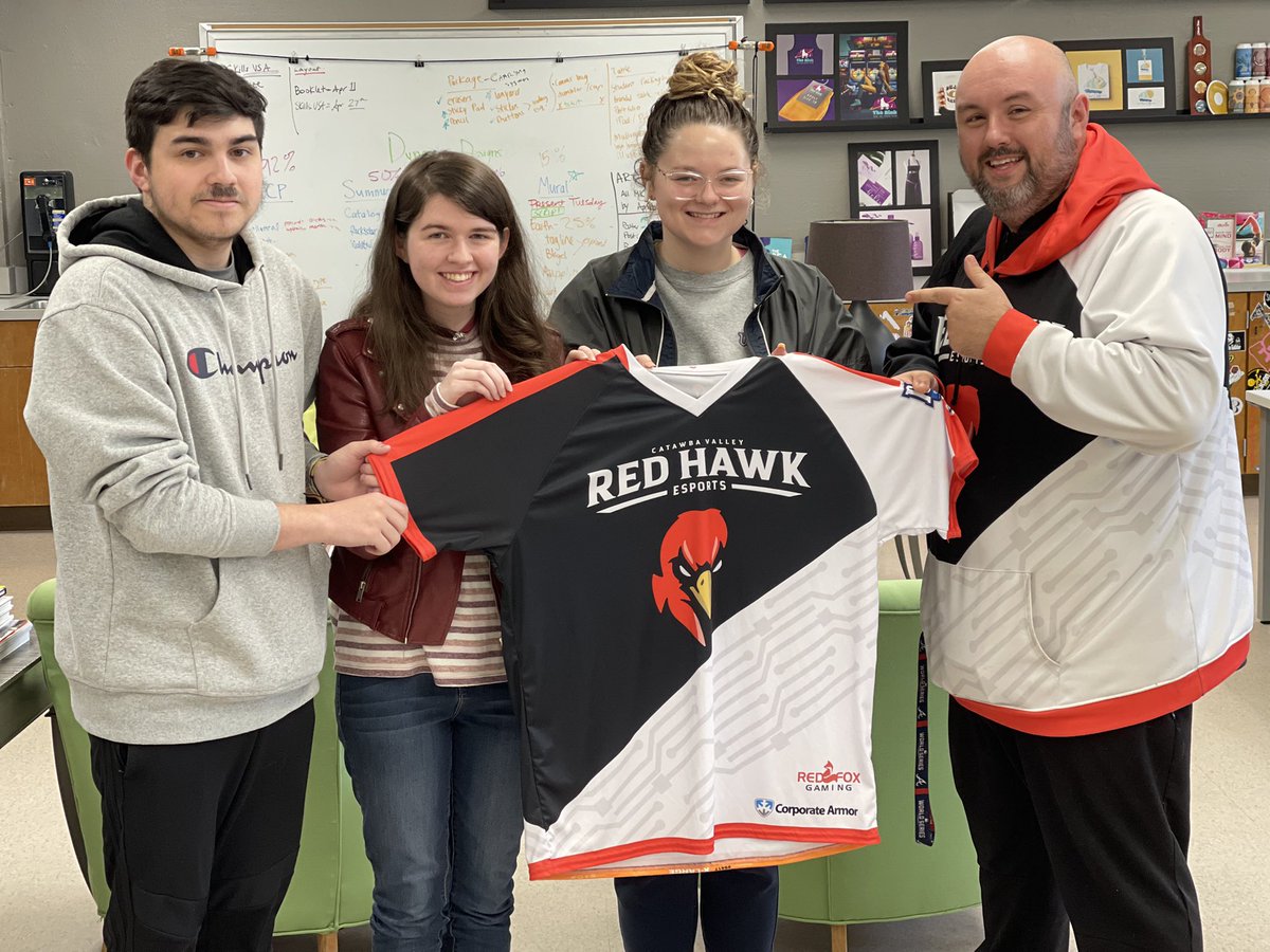 CVCCEsports's tweet photo. We presented our Advertising & Graphic Design students with a gift this morning - a customized jersey with the winning team’s names on it! #GameChangers 🎮 #RedHawkNation https://t.co/MTdeOqydGD