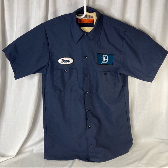 EricWaynesBrain's tweet photo. Tigers city connect jerseys should be a blue work shirt with everyone's name in a little oval on their chest. https://t.co/kRExuD7PNP