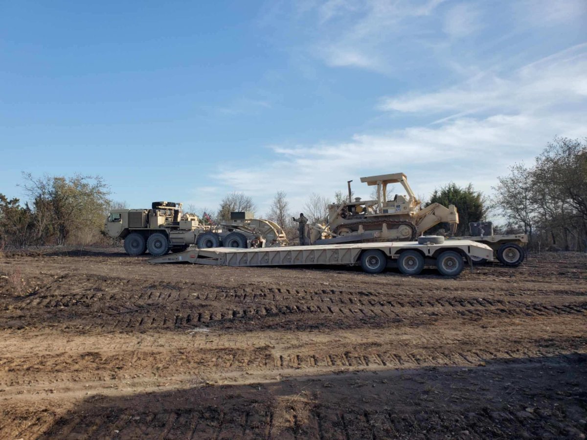 Leander_Fire's tweet photo. Crews from Leander, Cedar Park, and Round Rock FDs spent the day working fire lines at Fort Hood on the #CrittenbergComplex. Shown here are crews refilling from a Fort Hood mobile water supply, a firefighter on the fire line, and providing fire support to military dozer crews. https://t.co/LBU1p5Lmbi