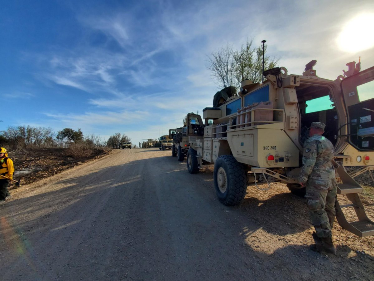 Leander_Fire's tweet photo. Crews from Leander, Cedar Park, and Round Rock FDs spent the day working fire lines at Fort Hood on the #CrittenbergComplex. Shown here are crews refilling from a Fort Hood mobile water supply, a firefighter on the fire line, and providing fire support to military dozer crews. https://t.co/LBU1p5Lmbi