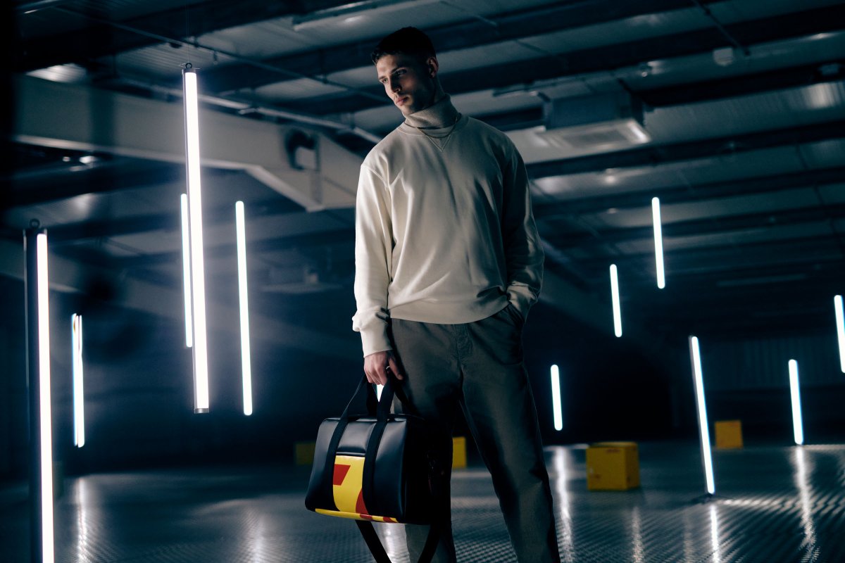 DHLUS's tweet photo. We're proud to have teamed up with @been_london to create a collection made from 100% recycled materials. Our Circuit Collection marks one step closer to our shared sustainability ambitions with @F1.
https://t.co/LNuN5iM2Sf
#AtEveryTurn #CircuitCollection #DHLF1 @DHLMotorsports https://t.co/rsGGCKoQY3