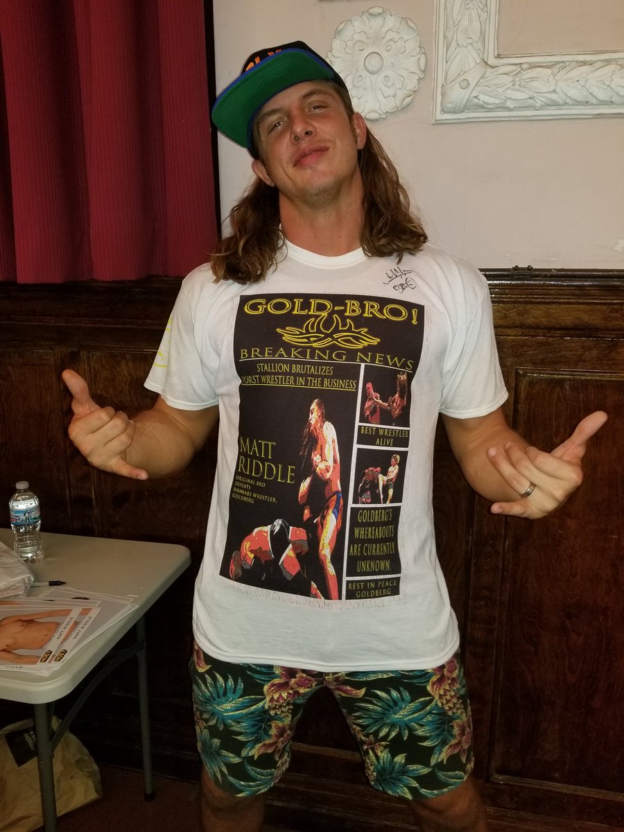 AceOfJames1's tweet photo. @Inside_TheRopes Matt Riddle. Made him a dope tee as a gift. He was nice enough to wear it for the rest of his signings. https://t.co/HTyIy8dgwi