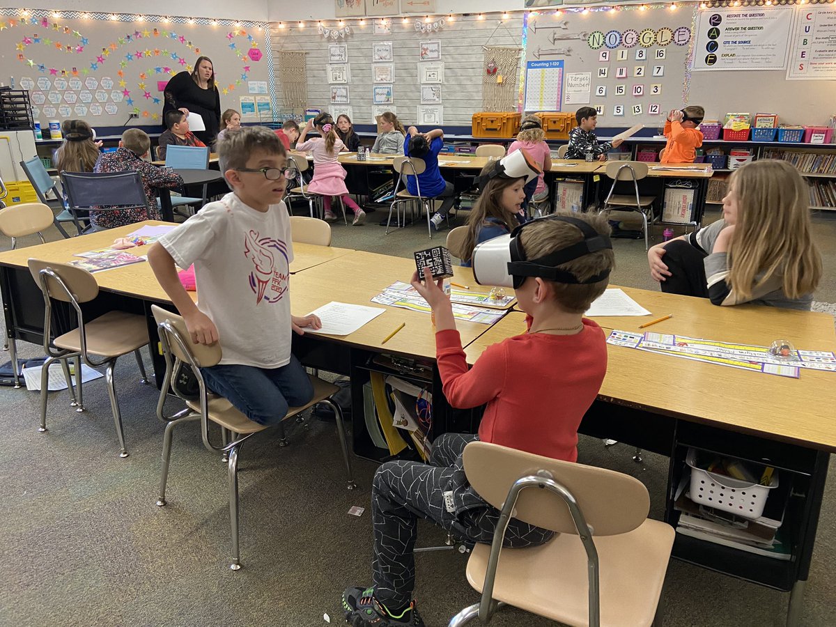 MrKline_EdTech's tweet photo. Mrs. Dillonβs 2nd graders used the @ClassVR cubes and headsets today to look at 3D shapes. Students had to explain their properties to their partner who had to guess the shape. π¨πΊπ’ Then they went on a #Virtualscavengerhunt to find shapes in the real world!! @twinlakesschool https://t.co/ToQbRfq476