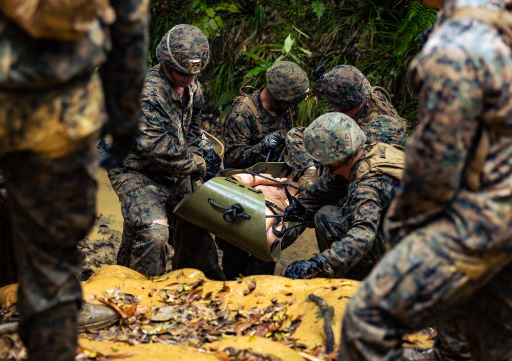 USPACOM's tweet photo. .@PacificMarines with #IIIMIG participate in casualty evacuation training at Jungle Warfare Training Center, Camp Gonsalves, Okinawa, 🇯🇵. #FreeAndOpenIndoPacific #Readiness #Lethality

📸: Cpl. Colton K. Garrett https://t.co/ZGabidOynP
