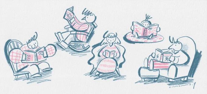 座りながら本を読む人たち 