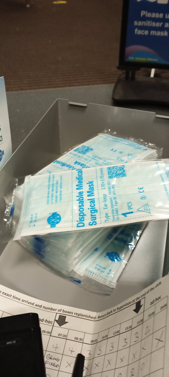 Novak_the_cat's tweet photo. Today's bit of madness. At the Royal Blackburn Hospital they pay a man to open all these sealed masks and put them into a dispenser for the public to use! Clearly Blackburn has money to burn. https://t.co/jcEAT1pm1r