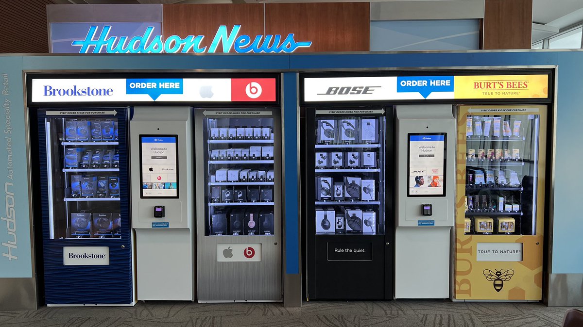 Neat automated retail wall at <a href="/flysanjose/">San Jose Airport</a> airport operated by Hudson news on the outside wall of their store.