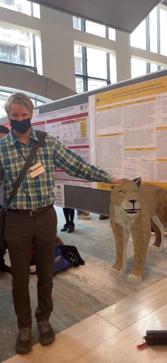 pugh_learning's tweet photo. This is how you do a poster. @Imogen_herrick &amp; @GaleSinatra doing awesome research involving virtual saber tooth tigers! So fun! #NARST2022 #narst22 https://t.co/MnuS2kwGNY