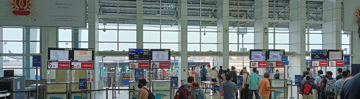 TWaCIndia's tweet photo. @IndiGo6E Mumbai T1. Silent airport. Display at gate 11. Boarding happening at gate 13. Staff response: Airport is responsible! https://t.co/g383JMSG0b