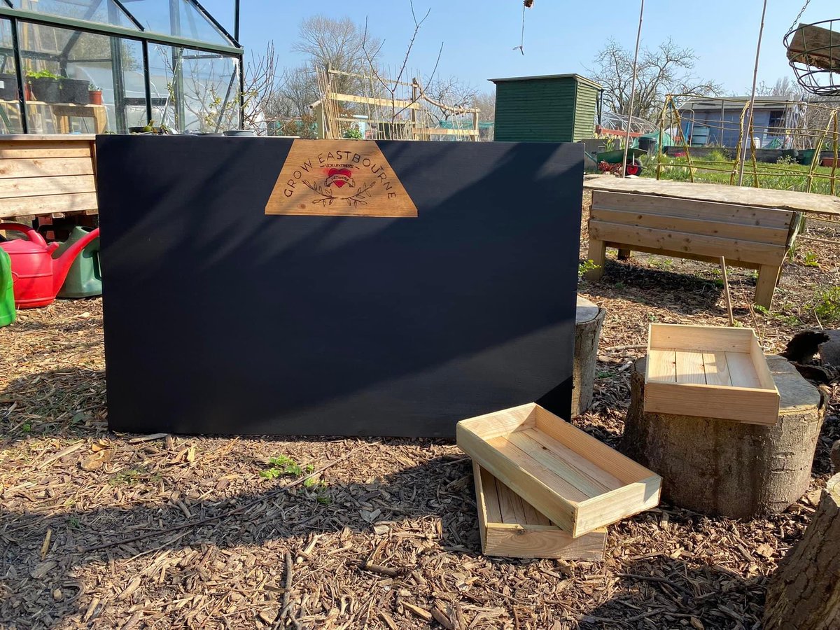 GrowEastbourne's tweet photo. Thank you so much to the Hampden Park Shedders and Linda, who handed over this masterpiece! Recycled from a disused table top with our logo lovingly pyrographed into the wood. We’ll be using this to keep track of our planting. Thank you very much 🥰 https://t.co/ovwmFAUMFr