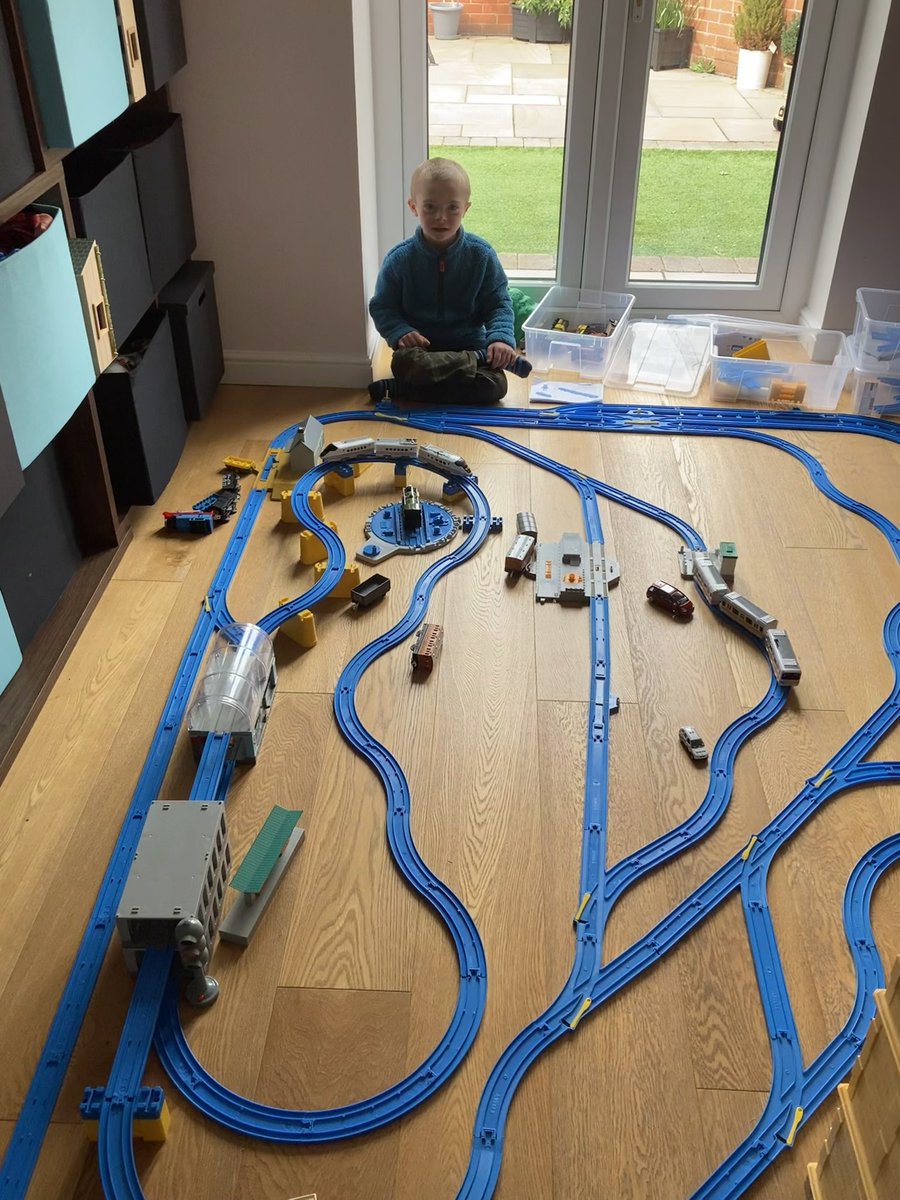 this_alexander's tweet photo. I’m starting to feel better after catching covid. My Dad and I built a big train track and I’ve been controlling all the points. I’d love to drive a real train one day! #thomasthetankengine #positiveaboutdownsyndrome https://t.co/qsPdyBHA5q