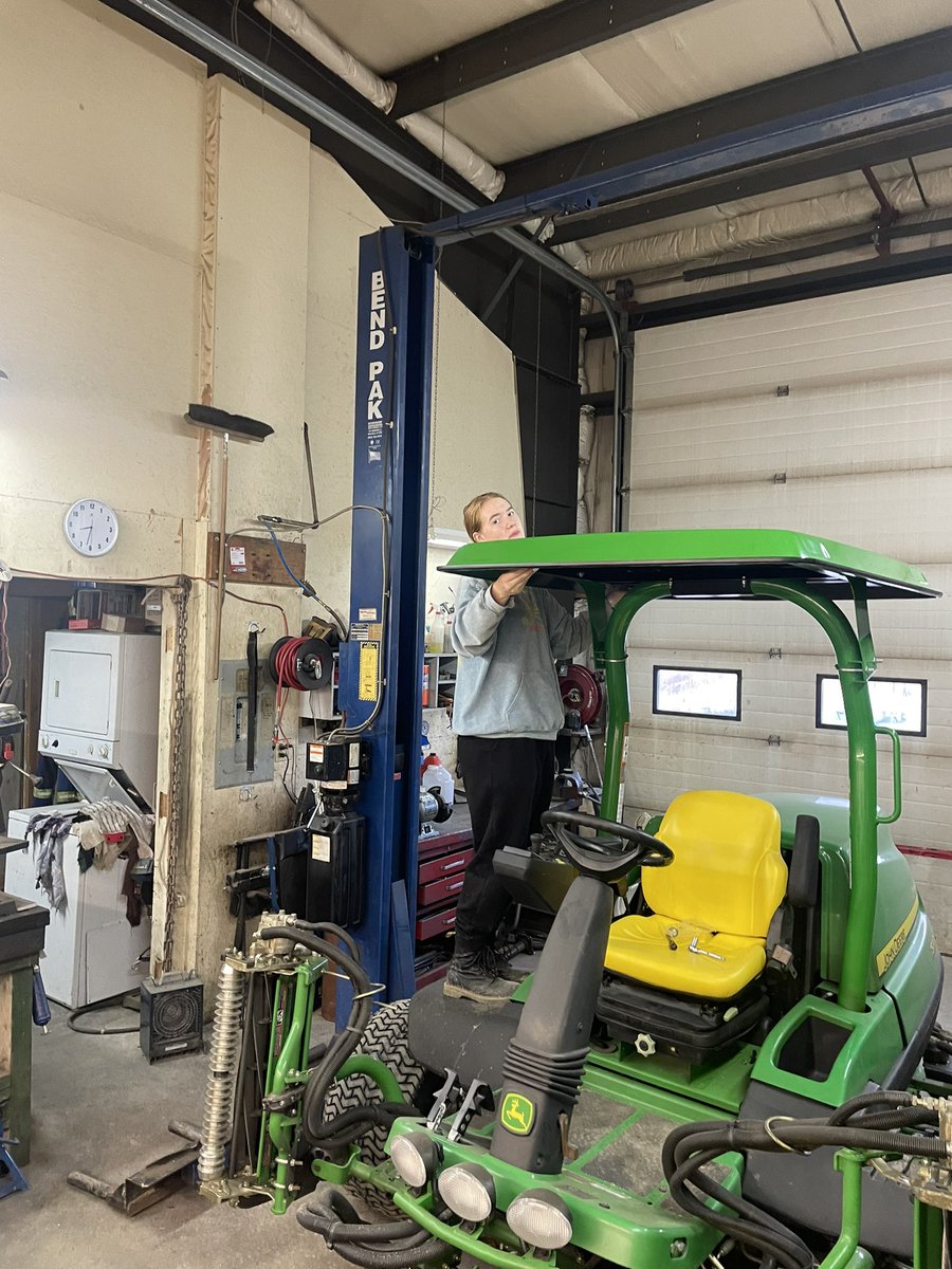 Young worker learning to do some wrenching. Canopy going on and then out to mow some fusarium 👍