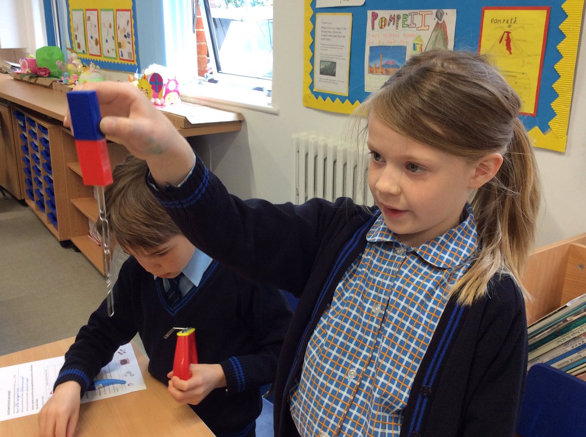 StMargs_Year3's tweet photo. Investigating magnetic forces today in Science. Lots of awe when creating temporary magnets with paper clips @StMargaretsPrep. #StMargsScience https://t.co/YE7GhAADRQ