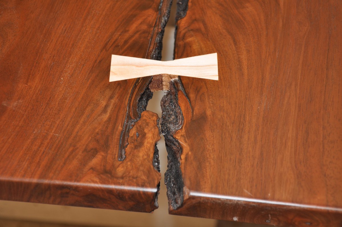 A classic maple butterfly joint holding two #LiveEdge slabs together. Learn more at liveedgewoodcountertops.com