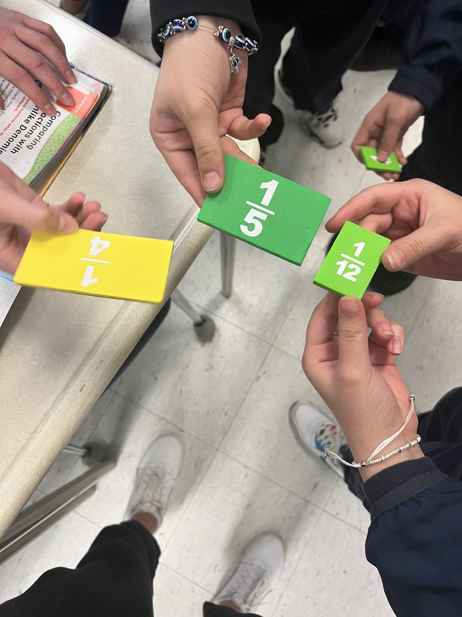 msmarinelli's tweet photo. Hands on math activity this morning! @StGregoryCS grade 6 students compare fractions with unlike denominators! ๐#math #manipulatives #handsonlearning @tcdsb #interactivemath https://t.co/nSHlnb3fbv