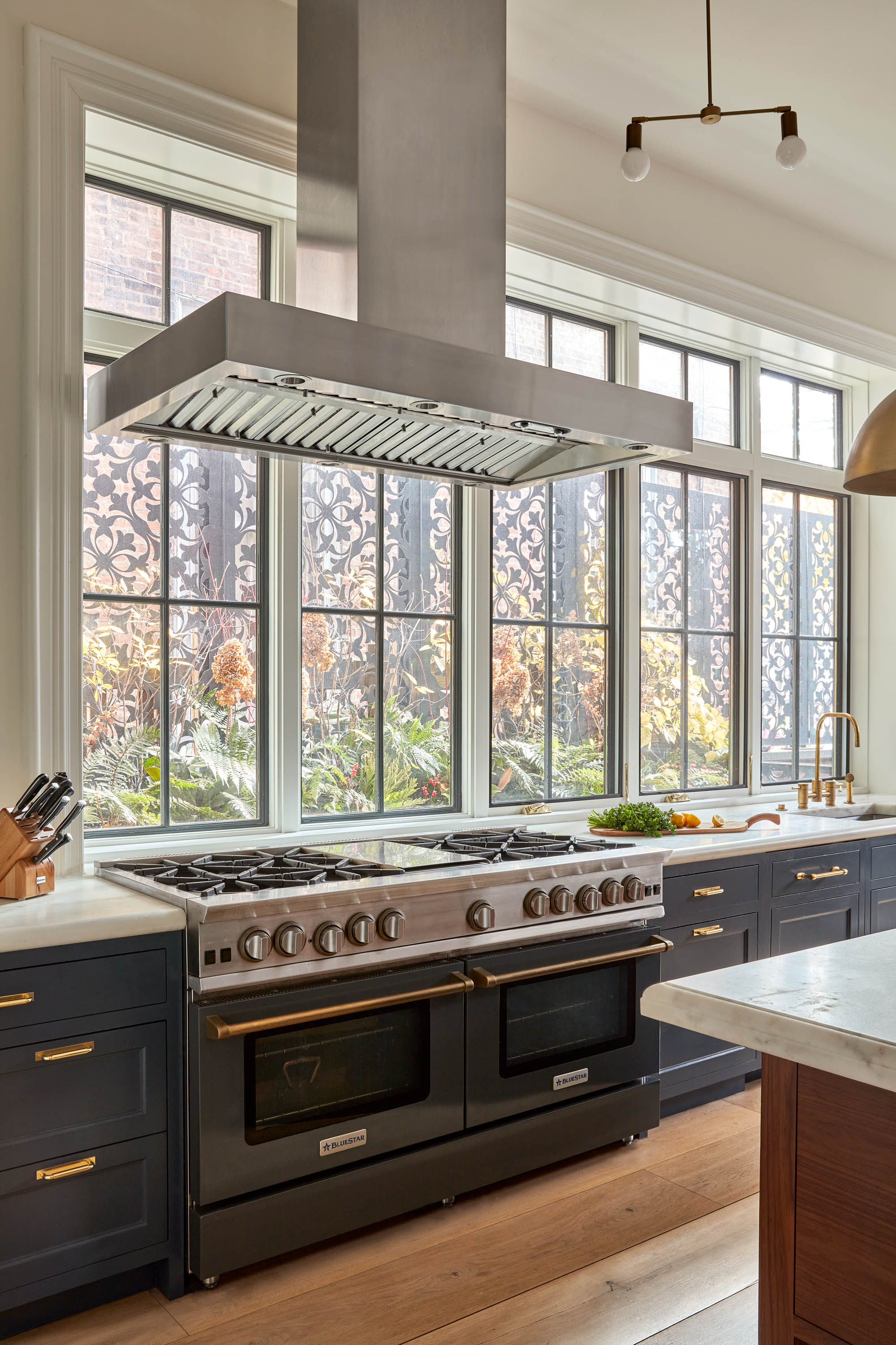 Range hood in 2024 front of window