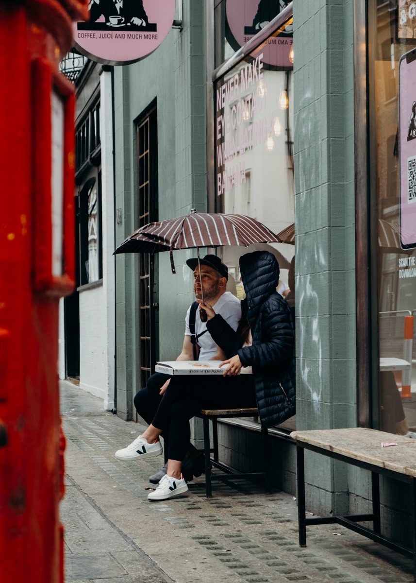 Pizza under umbrella? Heck yeah! 

I'm putting together a list of pizza places to visit in Milan and literally drooling all over my keyboard. Where did you have your best pizza?

#streetphotography #london #soho #rainphotography
