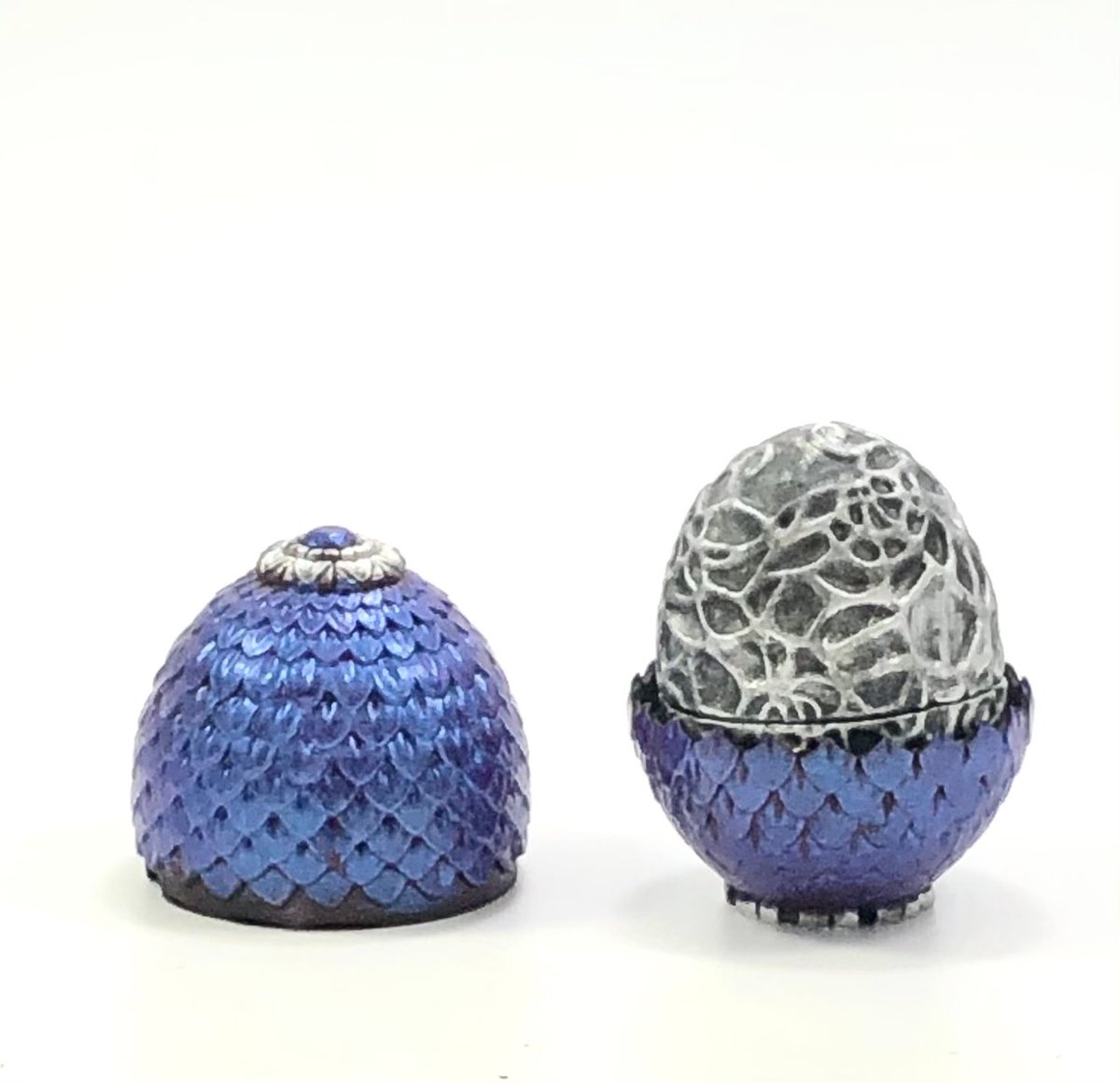 loubie_3D's tweet photo. Nest of dragon eggs - in time for Easter printing. A free model now available of 
@Cults3D 
https://t.co/99oZsDRXDR
#Dragon #3dprint #eggs https://t.co/2SxaPBVLUF