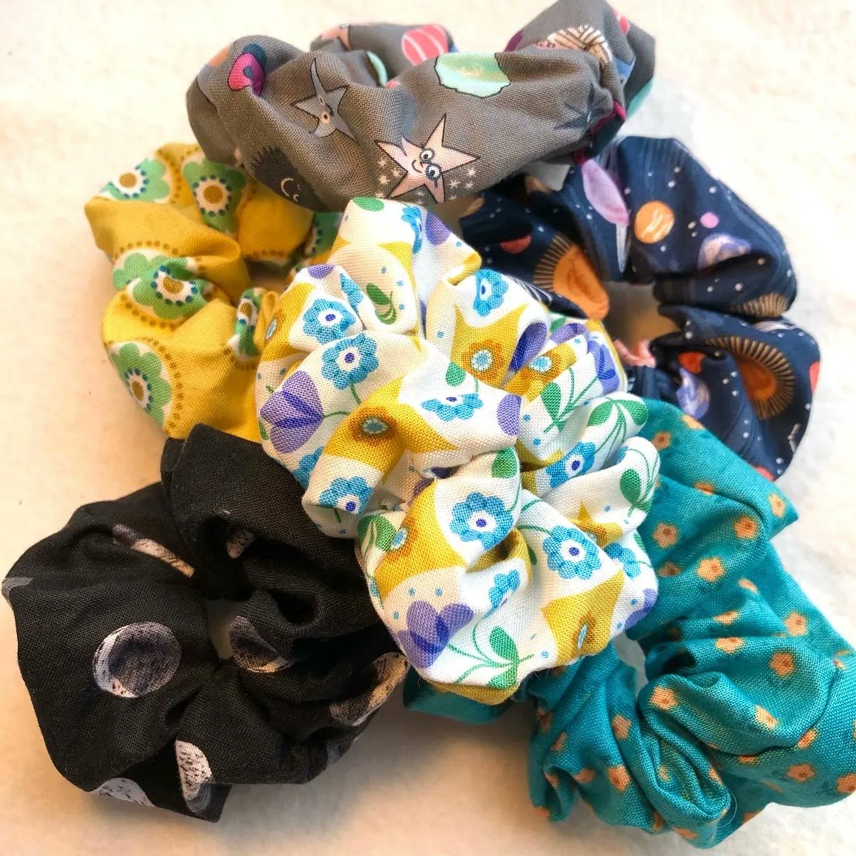 these are our current scrunchie designs, what should we do next? moondazestudio.co.uk