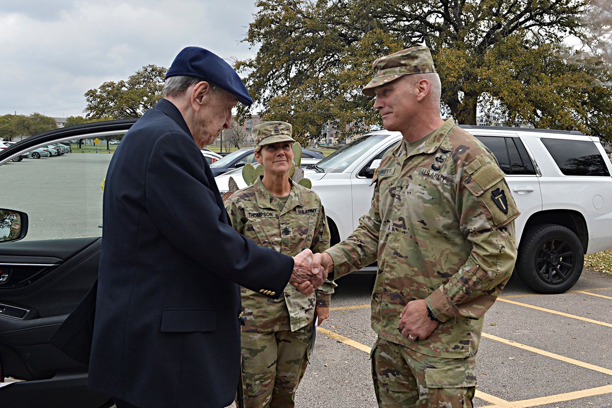 TXMilitary's tweet photo. Senior leaders from Texas National Guard's 36th Infantry Div. helped surprise #WWII veteran Stan Brooks on his 100th Birthday! He's a combat veteran who served in the Italian Campaign, attaining the rank of Corporal. #36ID Band played music and there was a flyover at #CampMabry. https://t.co/NS0dwRp4I6
