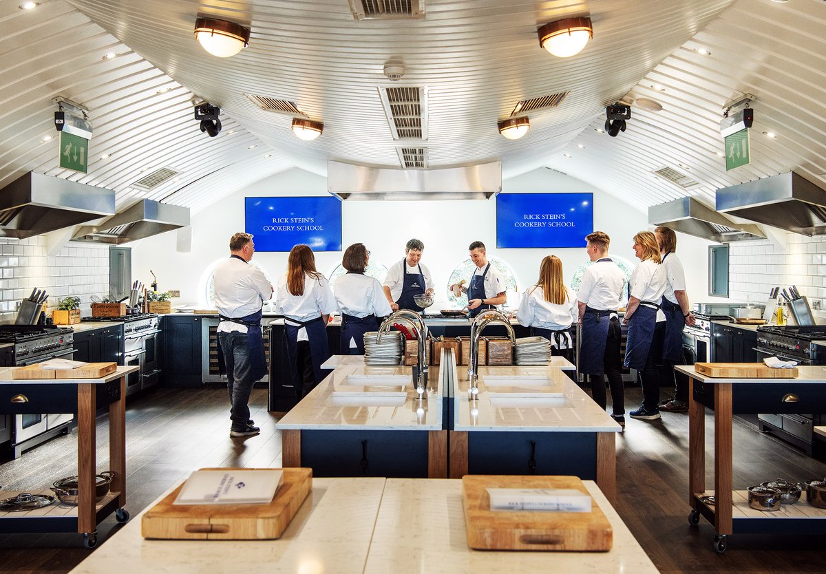 This is our new look cookery school. Nick and our chefs are really enjoying teaching fish cookery in such a fabulous dark blue and white tiled kitchen. Thanks @HowdensJoinery