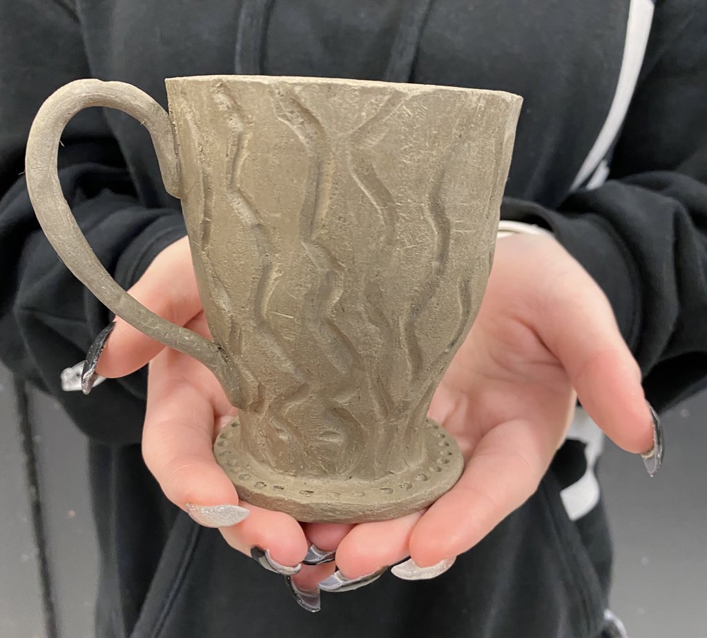 ddhanisch's tweet photo. “Mugging” for the camera. #pinchpots #formandfunction #carve #applique #potterypeeps #mudpuppies #practicemakesimprovement #bebrave #beginningpottery #ops_burke https://t.co/K7jtoqKfhg