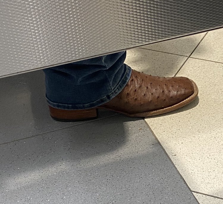 JonBrennan_com's tweet photo. Im freaking out!! At the airport restroom and George Strait is in the stall next to me!! What do I do!!?? I’m gonna start softly singing one of his hits. “Well excuse me but I think you’ve got my chair”. No wait. Uhg. https://t.co/Jq7Bj7L5yy