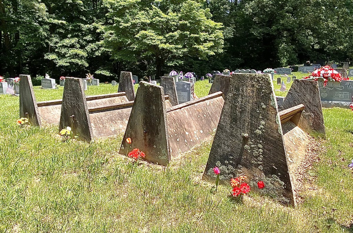 (1/2) A row of tent or “comb” style graves at Liberty Cemetery in Overton County, Tenn. This style of grave marker is usually found on the Cumberland Plateau of Tennessee but can also be found in parts of northern Alabama and Arkansas.