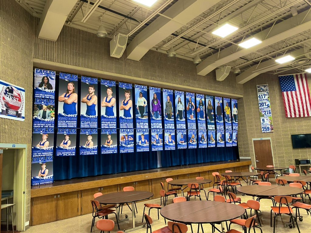 Always so fun to see the kids from opposing schools stop and stare in awe on their way to the gym. Mr. Rodgers doesn’t get enough credit for this idea! 🙌🏻 #FavoritePartOfTheSchool #CelebrateSuccess #HanginBanners #UWoodEaglePride