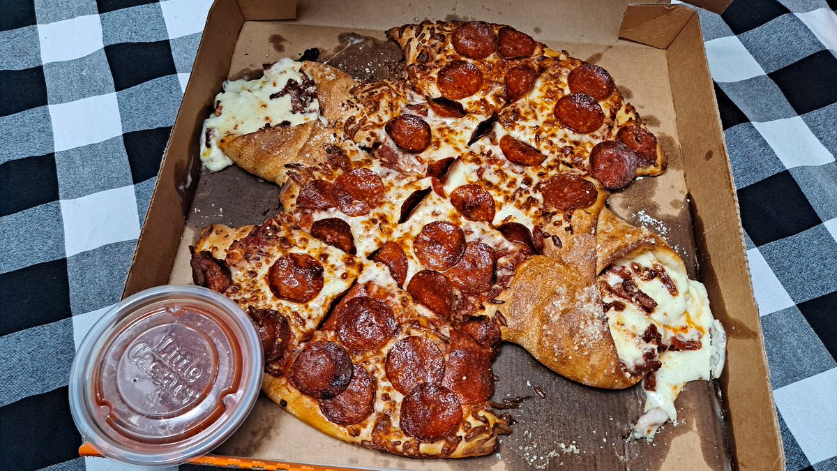 ItsManiacZack's tweet photo. Pizza Pizza! Batzoni #Calzony is the hero we need right now. @littlecaesars should make them forever. https://t.co/1MTpaPiNrW