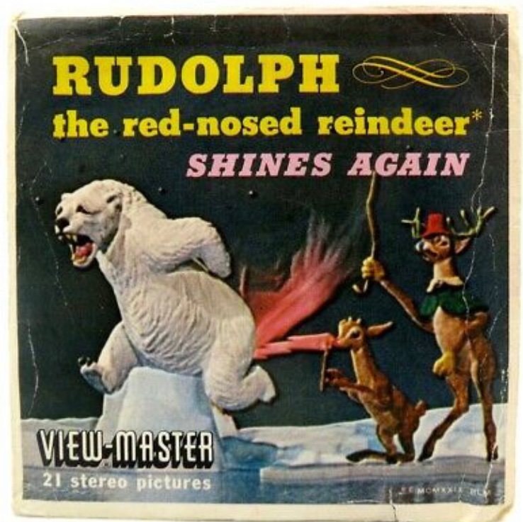 kickitupanacho's tweet photo. What is going on here? 

 Is Rudolph using a magnifying glass to turn his nose into a raygun? 
 And who is the reindeer brandishing the cane? https://t.co/iW4UKvd1Fk