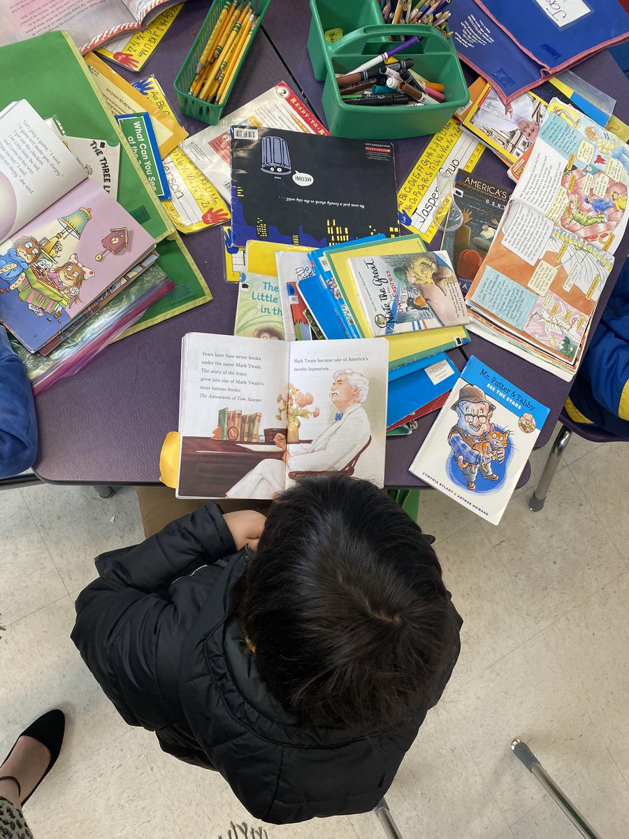 CorduckJenny's tweet photo. What’s better than seeing a 1st grader with a pile of books? @LPSLiteracyK5 @BowmanLexPTO https://t.co/FcdbyYsSF2