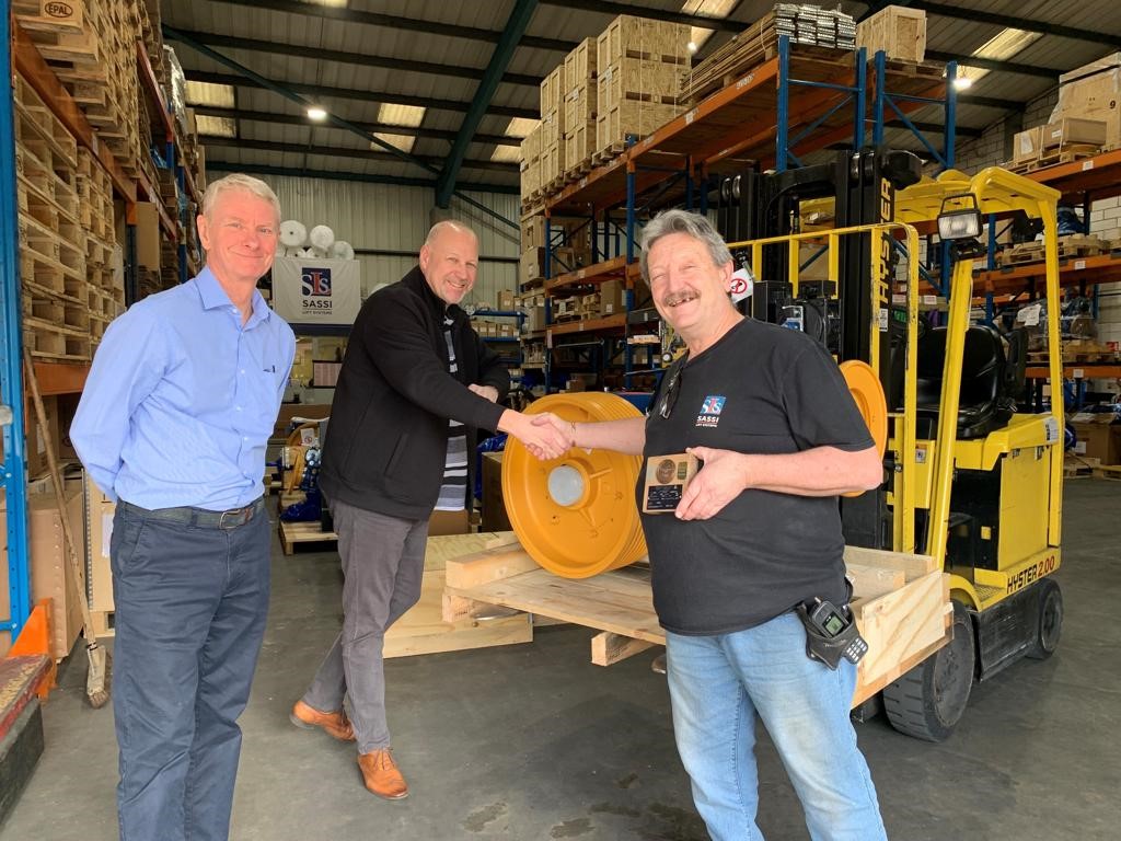 Thank you for your outstanding service! Nigel Wilde our Warehouse Inspector, gratefully receiving a "40 years of loyal service" placard from our Managing Director, Ian Justice and Operations Director, Shaun O'Neill. Thank you, Nigel, from all the team at SLS.