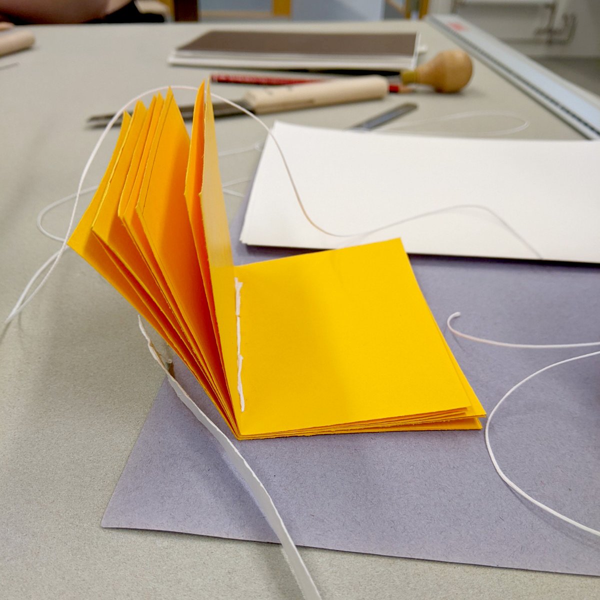 UWECreativeWrit's tweet photo. At last week's #bookbinding workshop with @mir_harr we learned #pamphlet stitch and made all kinds of adventurous creations📚From simple & beautiful pamphlets to an amazing five-books-within-a-book... Lovely work everyone! #makingbooks #bookarts #bookbindingstudio https://t.co/b0RRuS2OMv