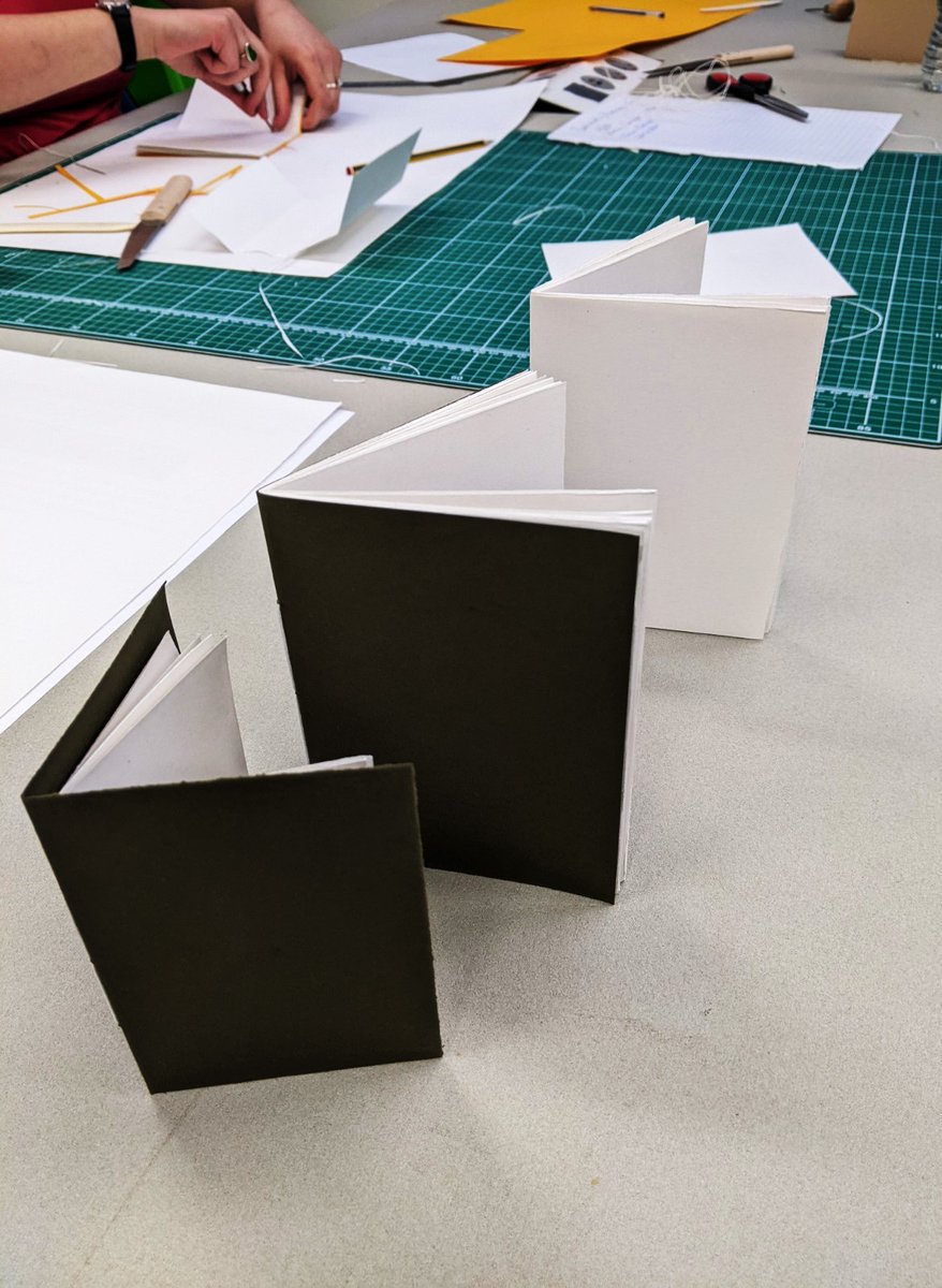 UWECreativeWrit's tweet photo. At last week's #bookbinding workshop with @mir_harr we learned #pamphlet stitch and made all kinds of adventurous creations📚From simple & beautiful pamphlets to an amazing five-books-within-a-book... Lovely work everyone! #makingbooks #bookarts #bookbindingstudio https://t.co/b0RRuS2OMv