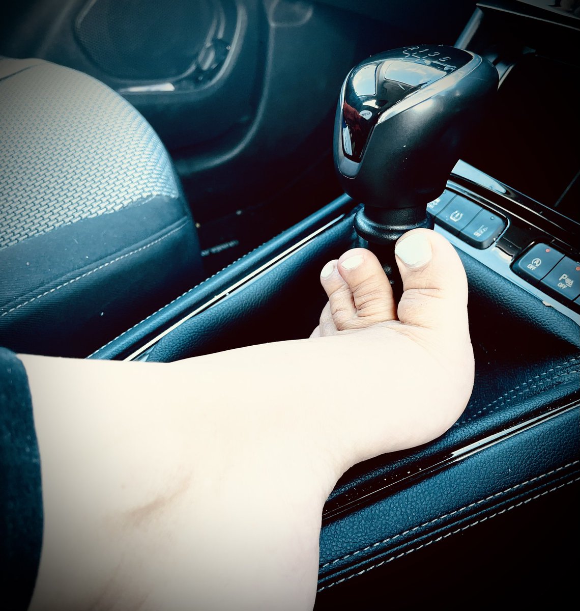 TinyICFeet's tweet photo. It’s illegal to drive barefoot, but not to sit and admire them. 
#ride #feet #feetloversonly #car #ankles #body #cute #toes #tiny #girl #manual #gear #gearstick #power https://t.co/ln2XBdOKLx