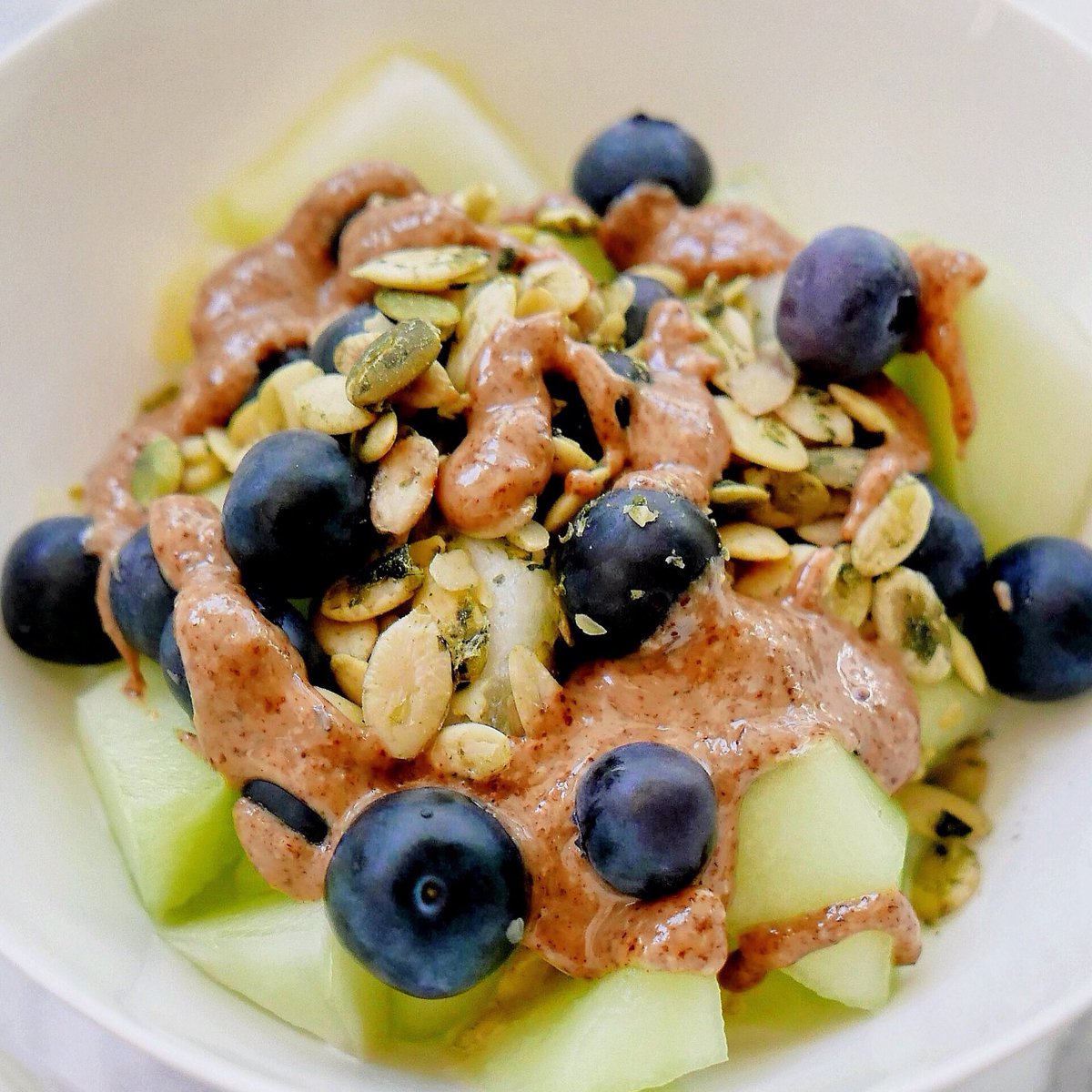 A completely delicious and nutritious breakfast made with 5 ingredients in 5 minutes. 

- 1 cup cut up melon 
- 1/4 cup fresh blueberries 
- 2 tablespoons sprouted pumpkin seeds 
- 1 tablespoon almond butter 
- 1 teaspoon orange blossom water

#atinutrition #wellness #foodmatters