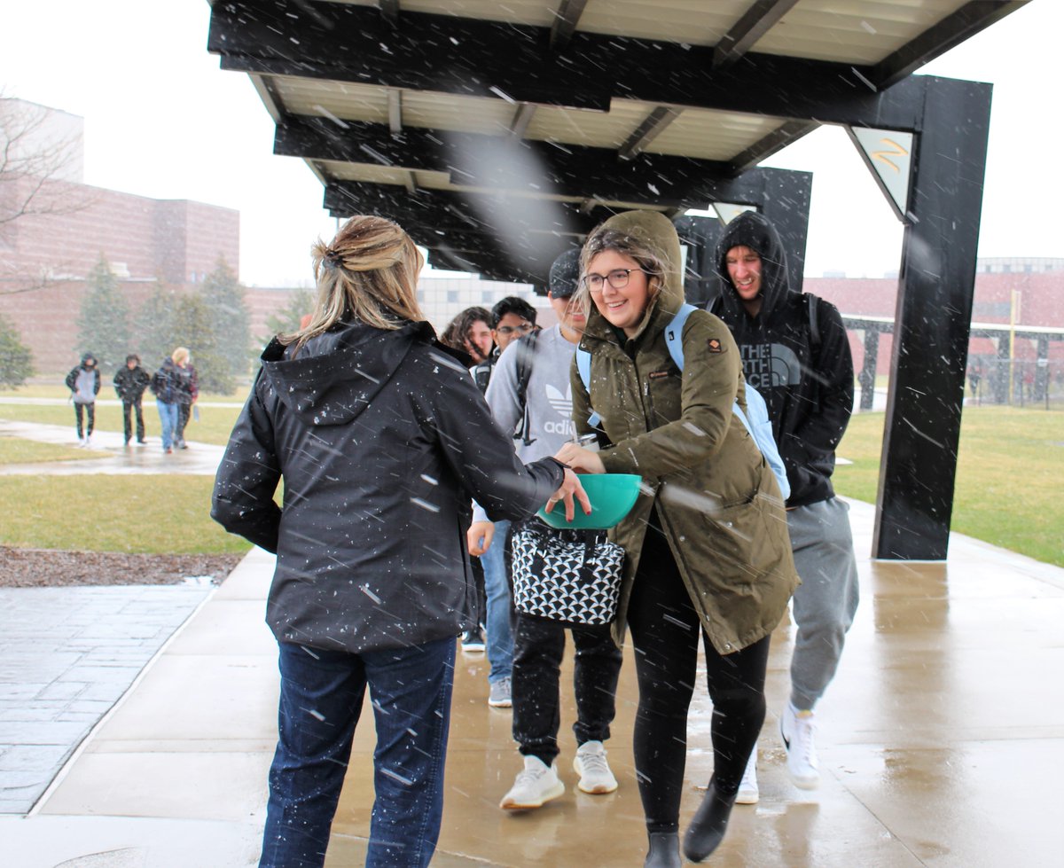 zeelandschools's tweet photo. It may have been chilly on the path today between ZE &amp; ZW, but Superintendent Mendham warmed students' hearts w/ sweet treats to celebrate Spring Break. It's been a long winter, ZPS. Wherever Spring Break takes you, whether it's home or away, we wish you JOY! #ZPSLearningForLife https://t.co/p3UhlONIIJ