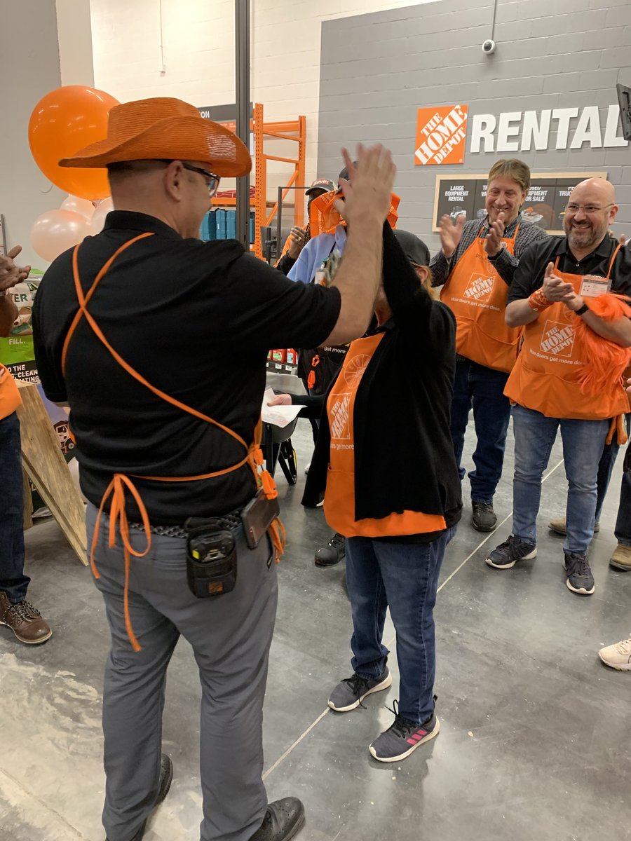 Mrs. Debbie gets a high five from the Big Dog Tim Hoover on a job well done!