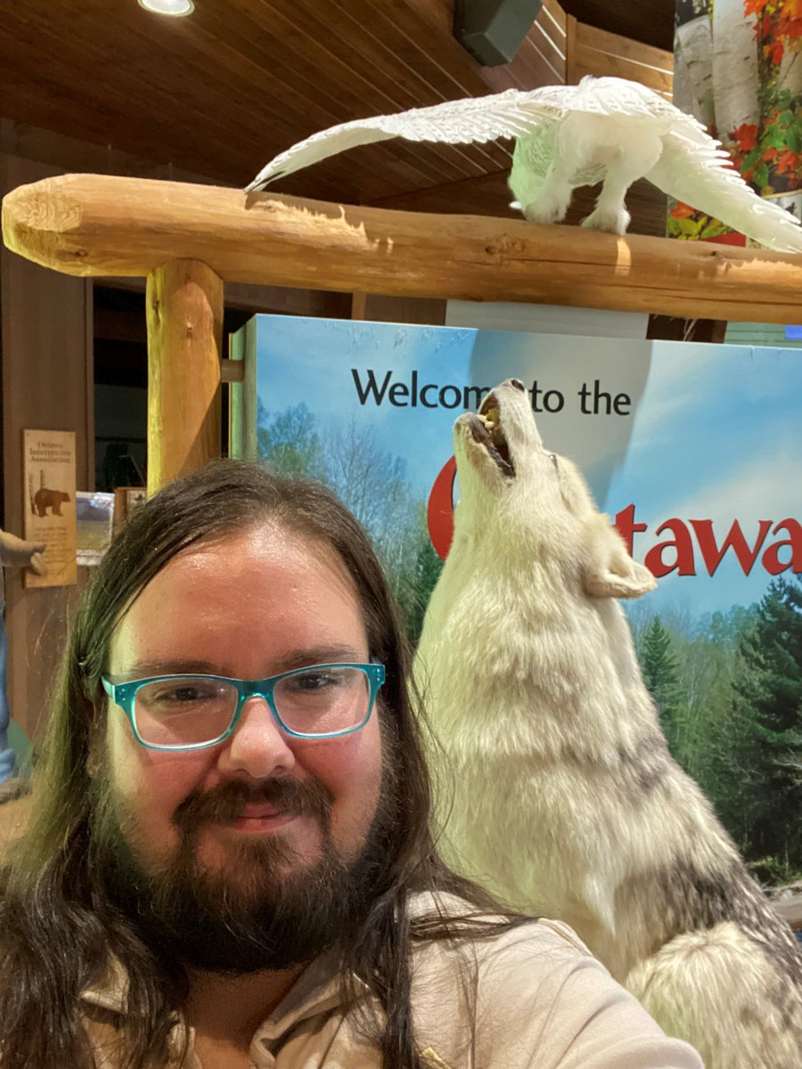 FSNatureWatch's tweet photo. Non-binary trans man Aerran keeps the wolves howling & visitors happy @OttawaNationalForest Visitor Center for #TransgenderDayofVisibility #ForestService #FSNatureWatch #BeVisible https://t.co/aRTsJmL0U2