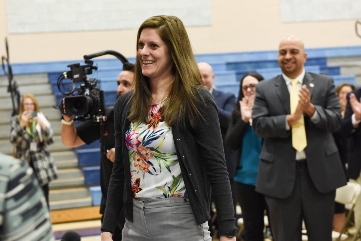 Milken's tweet photo. The gym at Ansonia HS gave math teacher Laura Baker-Coronis a deafening ovation when we surprised her with CT's #MilkenAward and $25K today! Here's why we chose her: https://t.co/7XUOZoL9mt

@AnsoniaSchools @EducateCT @CharleneRTedu @LGSusanB @Milken_jfoley #EducateCT #CTTeachers https://t.co/jqqiyDPEXG