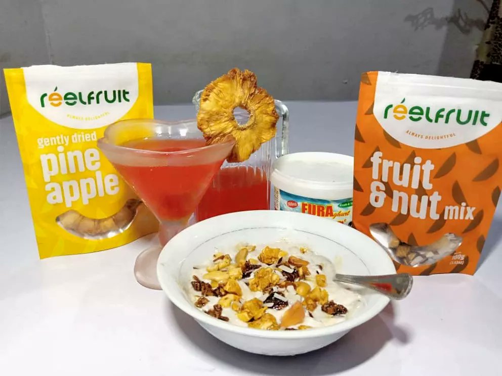 GloryCardy's tweet photo. I can't kill myself o!.This weather is too hot, this is how i am beating the heat with my frozen fura &amp; my reel fruit &amp; nut mix toppings &amp; extra chilled cocktail drink infused with dried pineapples takes it to a whole new level 😋😋
@ReelFruit
#ReelPhotoChallenge https://t.co/GFZVv1i1jM