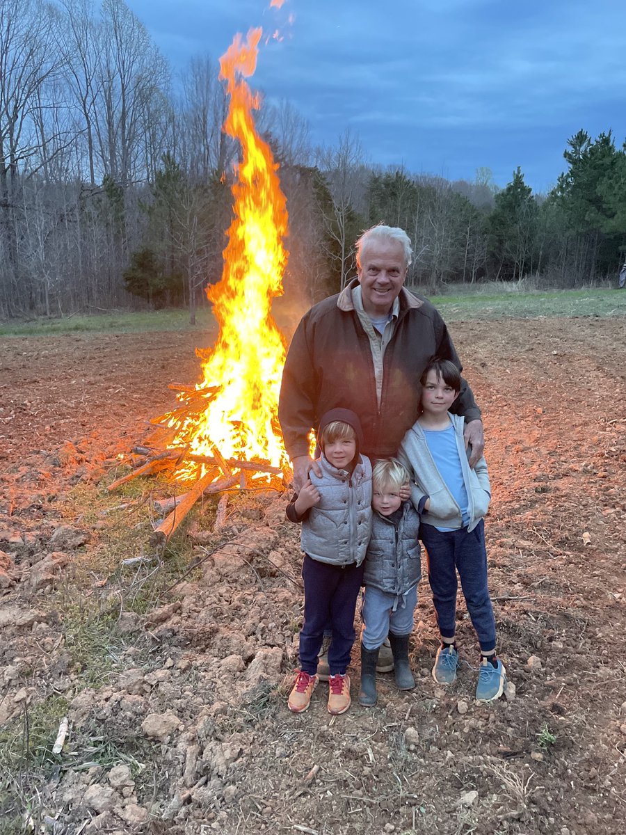Two years ago this field was grown up with mixed hardwoods, pines, and impenetrable undergrowth. Here, some of the grandchildren burn the last pile of brush before disking and planting seeds. If God is a consuming fire, could it be some of our fiery trials determine our increase?