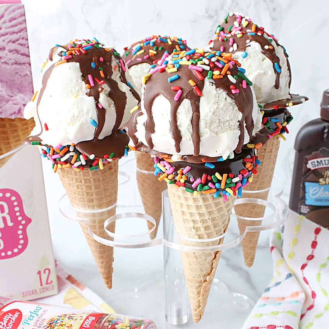 Surprise!! These Ice Cream Cone Cake Pops are a fun new way to eat your cake and ice cream too! #icecream #cakepops #partytreats #birthdaytreats bit.ly/3iUBMpY