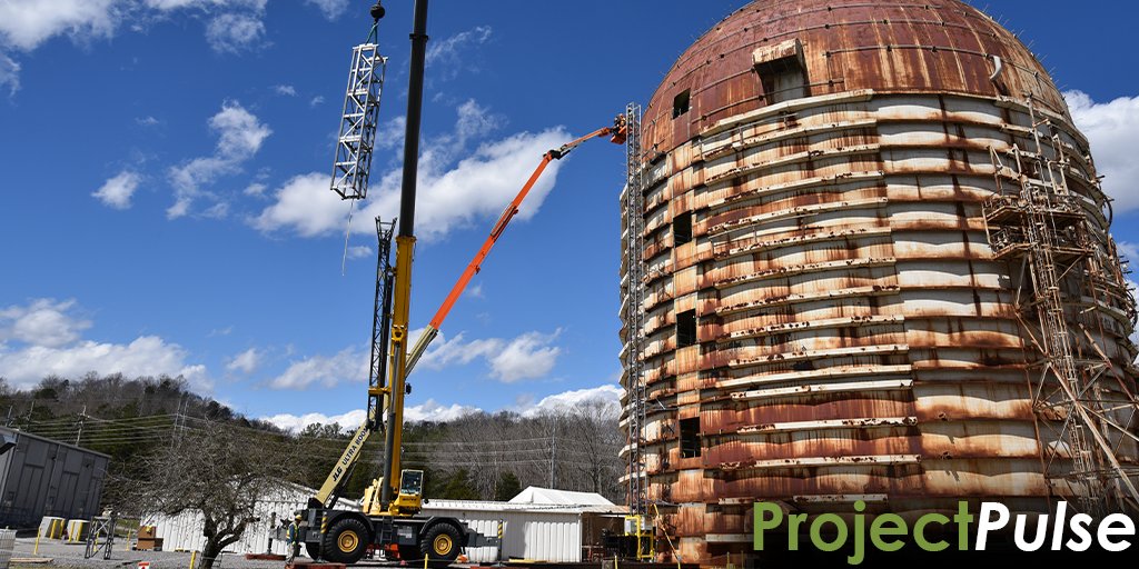 UCOR_TN's tweet photo. At ORNL, crews completed the assembly of the transport platform cart system at the Experimental Gas-Cooled Reactor. This project involved mounting a 110-foot mast to the outside of the structure and required coordinated efforts among specialty trades. #UCOR #projectpulse https://t.co/CtZCtopoYe